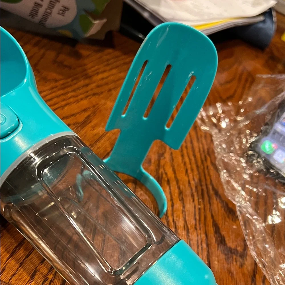 Pet Multifunctional Water Bottle with some little plastic bag inside New